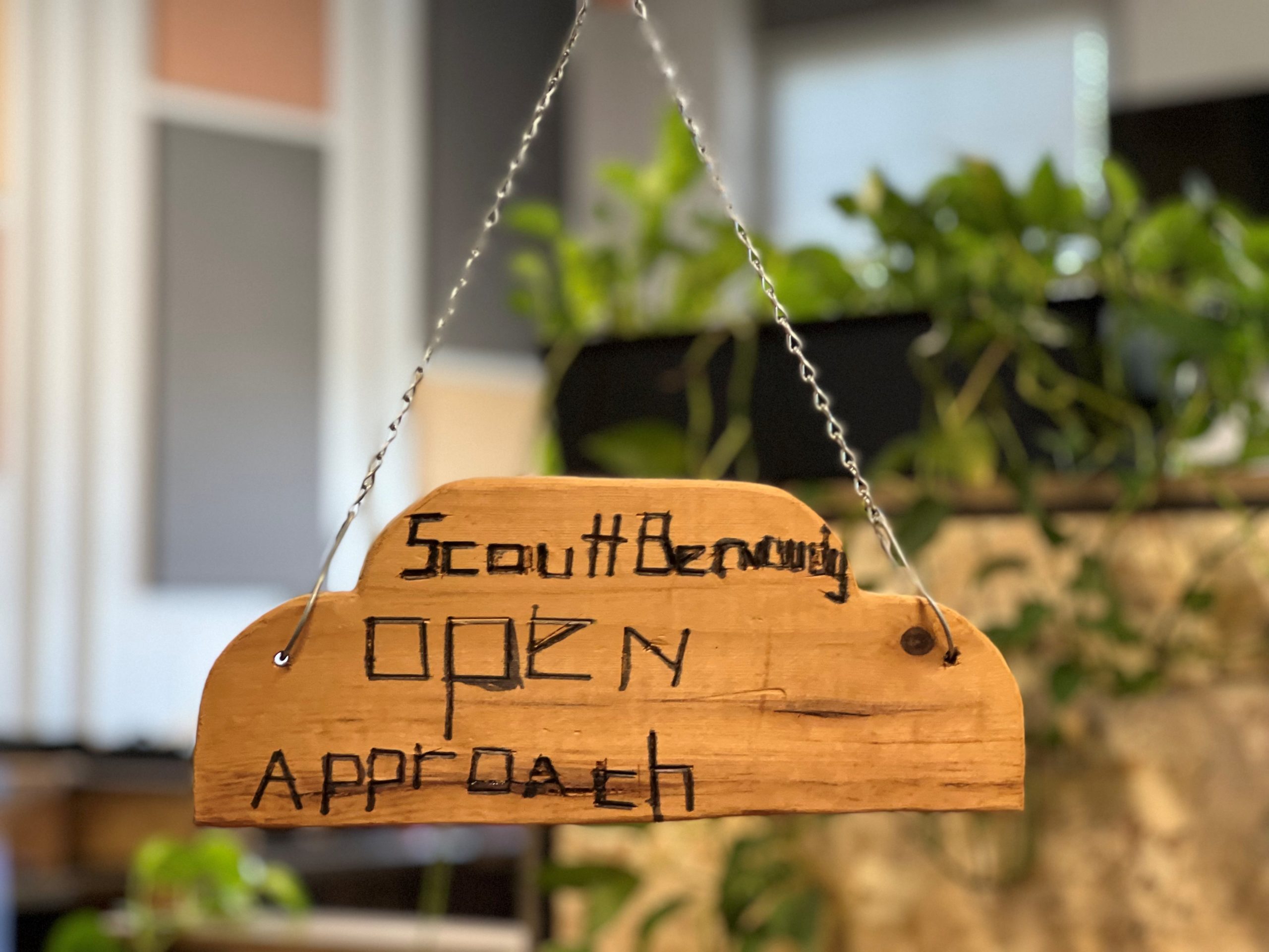 Wooden sign for it service company open approach