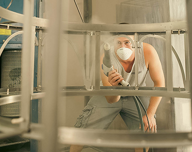 Person Spraying metal